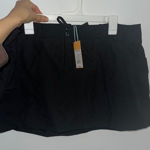 Brand new high coverage skirt withpockets in the front & bikini bottom attached